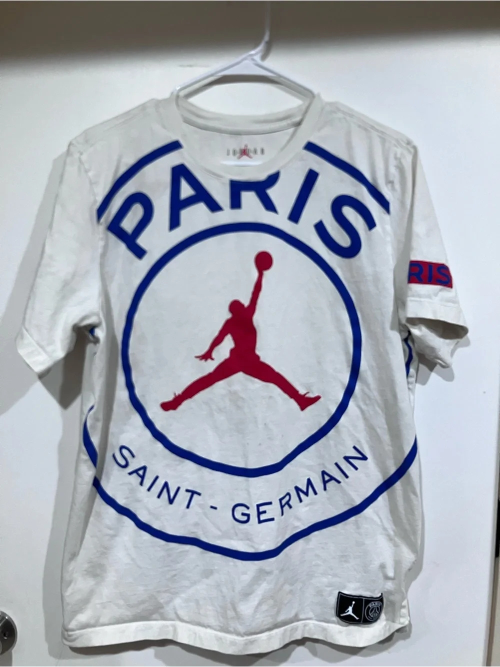 Jordan White Tee with Blue PARIS Graphic and Red Jumpman